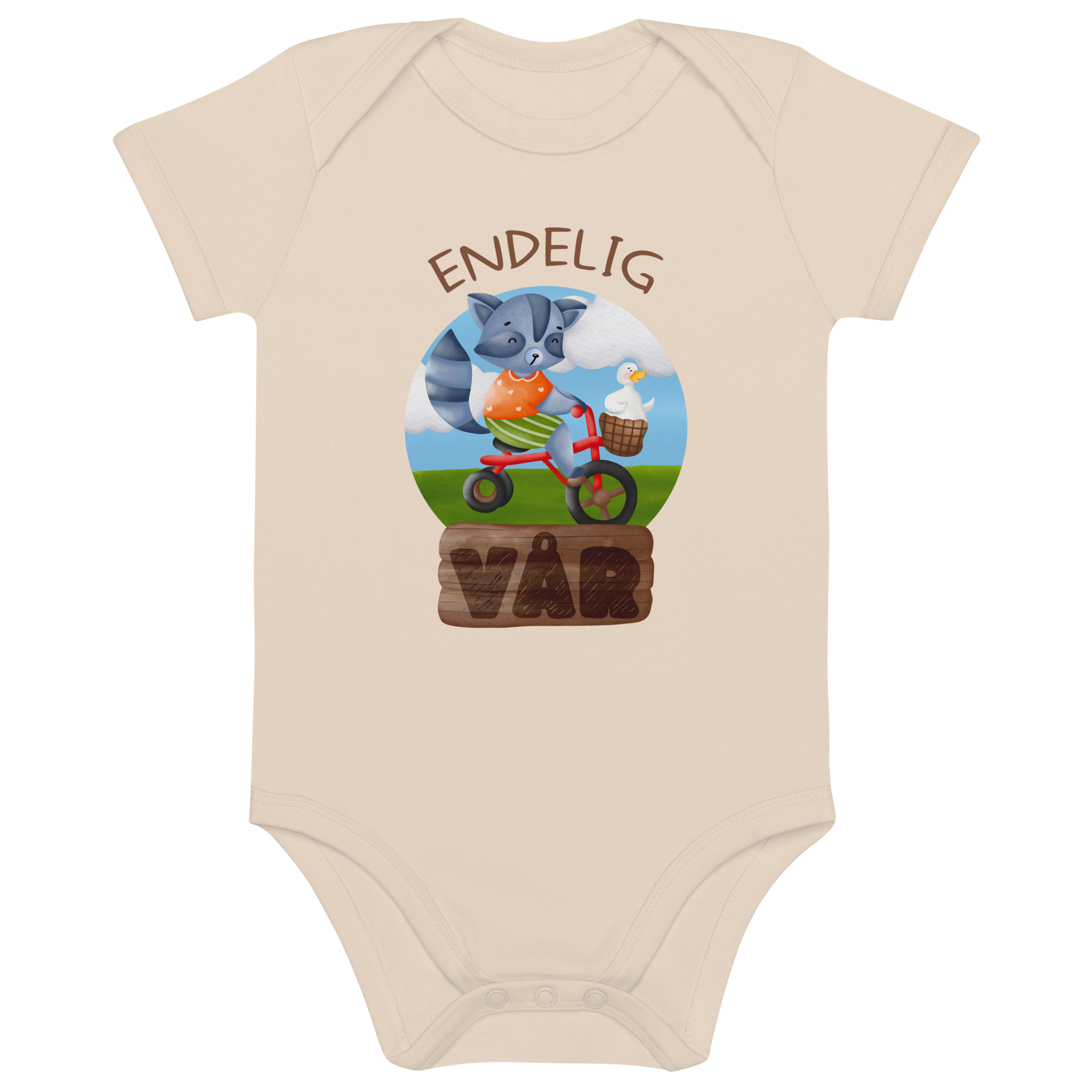 Beige babybody som ligger flatt, med teksten "Endelig vår" og figur av en glad vaskebjørn på sykkel med en fornøyd gås i kurven på styret. Foto.