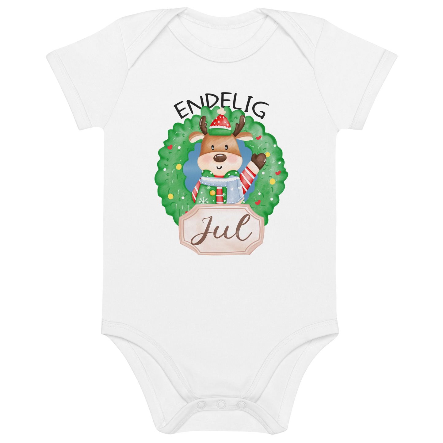 Hvit babybody som ligger flatt, med teksten "Endelig jul" og figur av en søt elg i julete klær med en julekrans rundt seg. Foto.