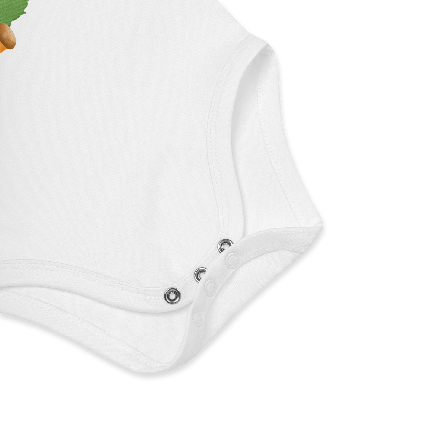 Babybody som ligger flatt, der bildet fokuserer på å vise trykknappene i kilen. Foto.