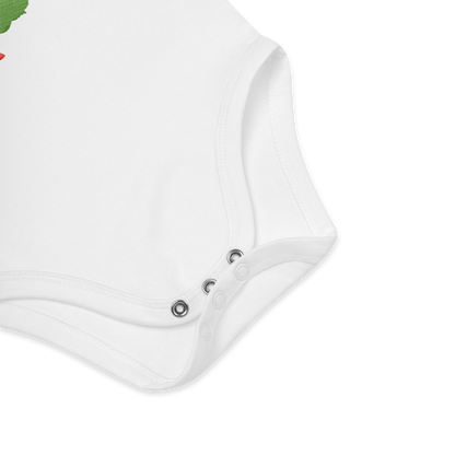 Babybody som ligger flatt, der bildet fokuserer på å vise trykknappene i kilen. Foto.