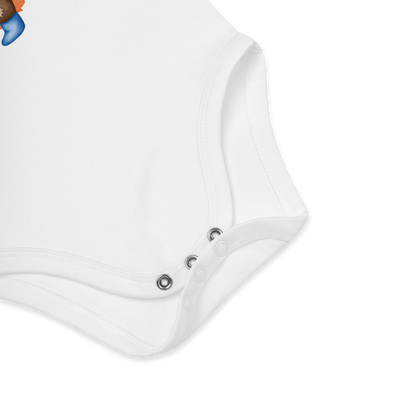 Babybody som ligger flatt, der bildet fokuserer på å vise trykknappene i kilen. Foto.