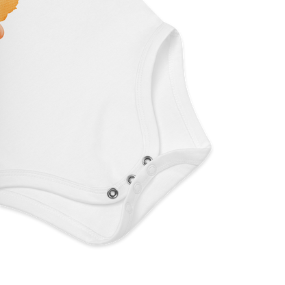 Babybody som ligger flatt, der bildet fokuserer på å vise trykknappene i kilen. Foto.