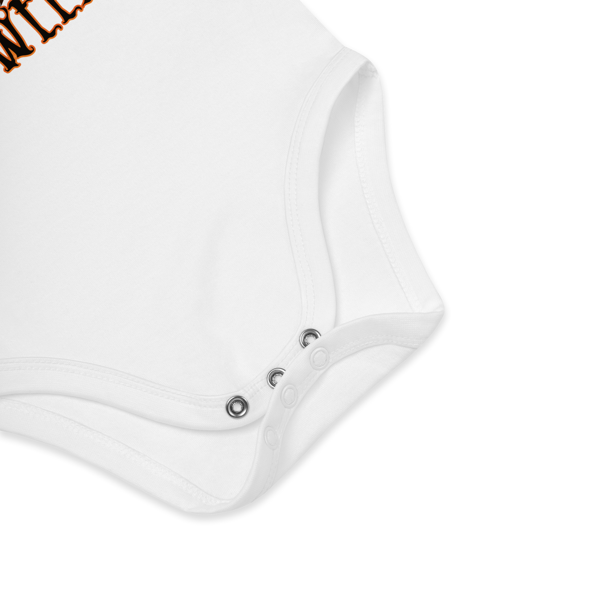 Babybody som ligger flatt, der bildet fokuserer på å vise trykknappene i kilen. Foto.