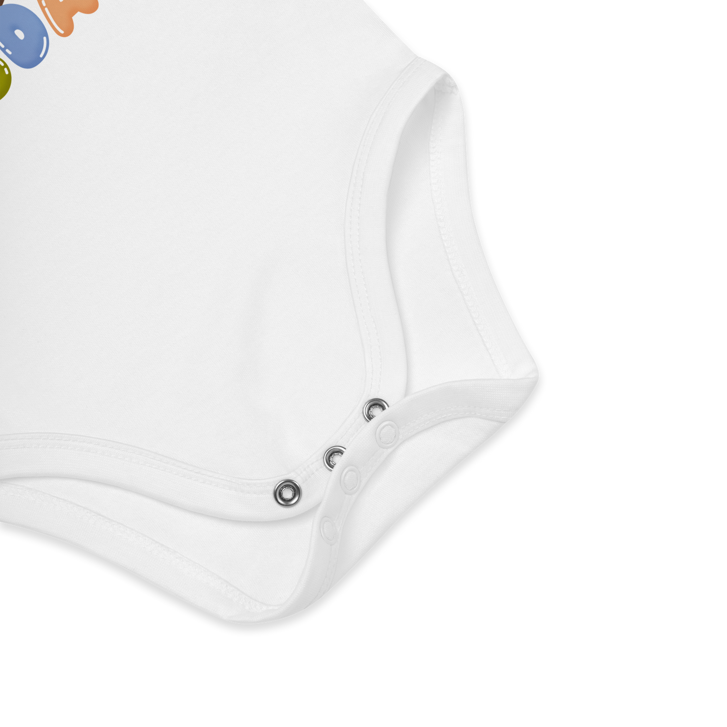 Babybody som ligger flatt, der bildet fokuserer på å vise trykknappene i kilen. Foto.