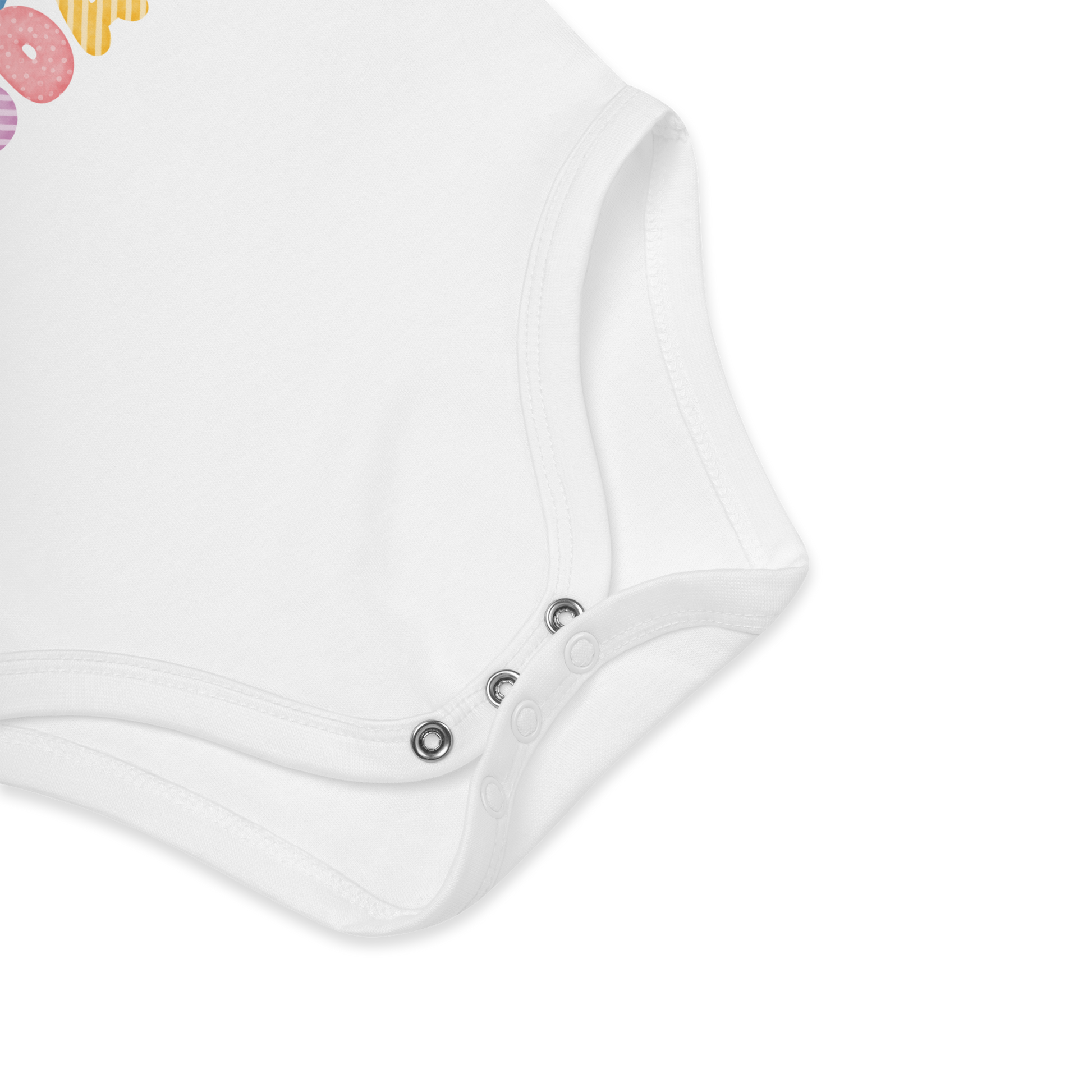 Babybody som ligger flatt, der bildet fokuserer på å vise trykknappene i kilen. Foto.