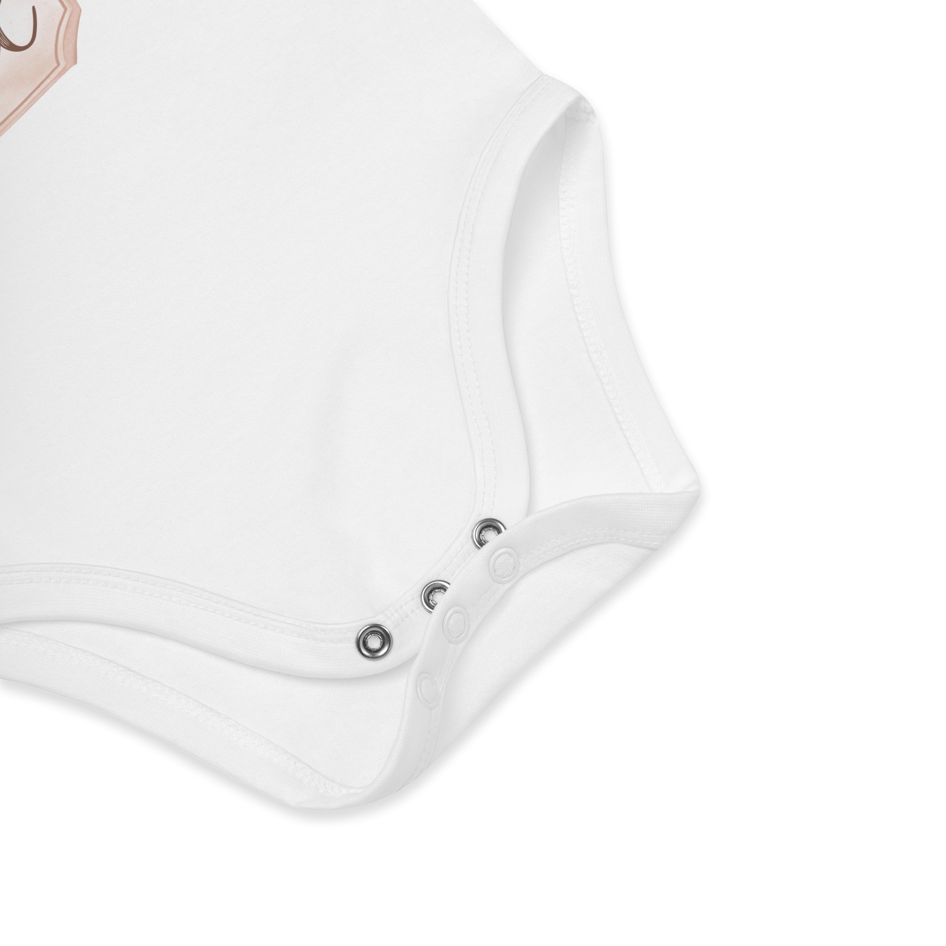 Babybody som ligger flatt, der bildet fokuserer på å vise trykknappene i kilen. Foto.