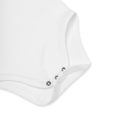 Babybody som ligger flatt, der bildet fokuserer på å vise trykknappene i kilen. Foto.