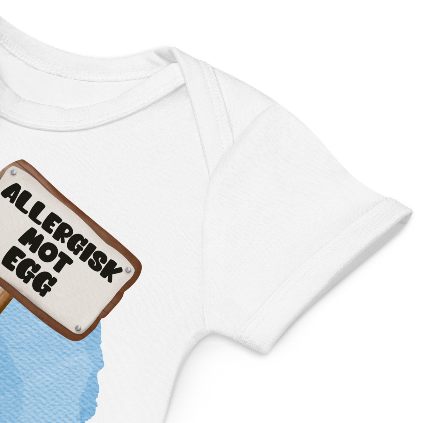 Babybody som ligger flatt, der bildet fokuserer på å vise at skuldrene er omslagslagte. Foto.