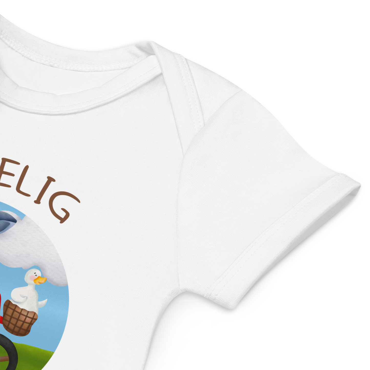 Babybody som ligger flatt, der bildet fokuserer på å vise at skuldrene er omslagslagte. Foto.